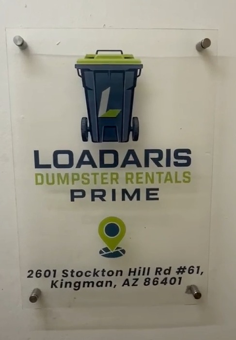 Clear acrylic office sign for Loadaris Dumpster Rentals Prime at 2601 Stockton Hill Rd #61, Kingman, AZ 86401